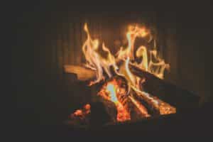 Burning wood in a fireplace.