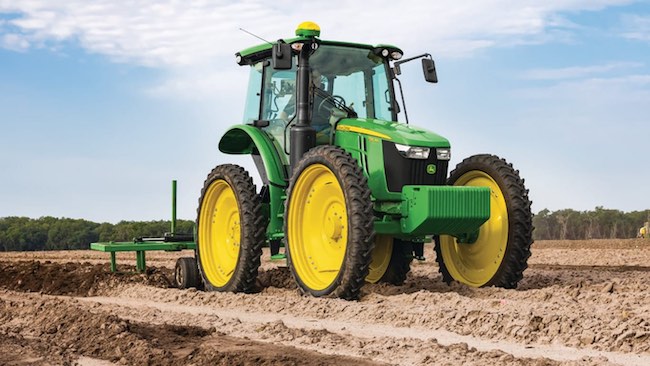 The very characteristic big wheels on a high-crop tractor. One of the most iconic designs of a tractor ever? Image source: Dealerwebcentral.