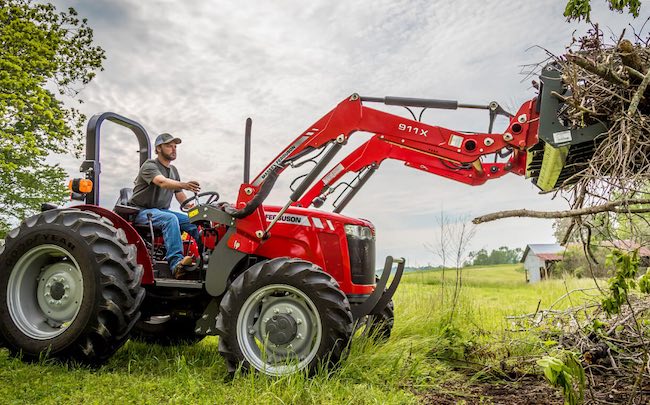 Farmer taking down a tree on his small farm with a Massey Ferguson. Image source: Masseyferguson.