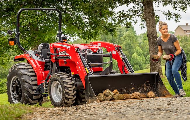 Woman removing stones from path way, load it up! Image source: Butlermachinery.